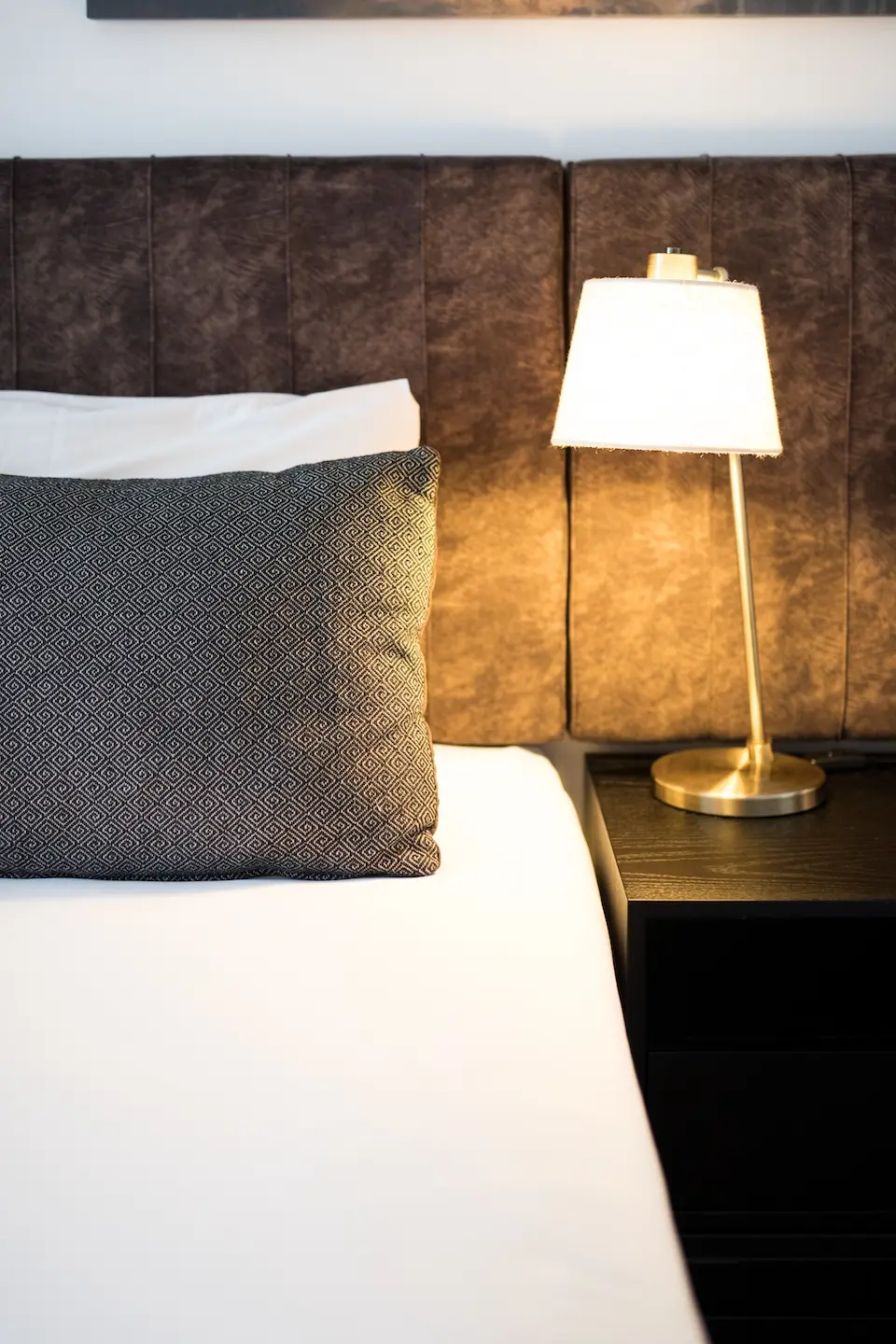 Hotel bed with bedside lamp 2021 04 05 20 51 10 utc
