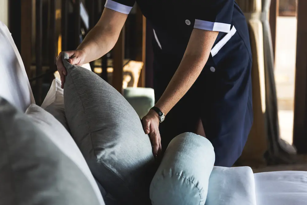 Housekeeper cleaning a hotel room 2021 04 02 19 56 56 utc
